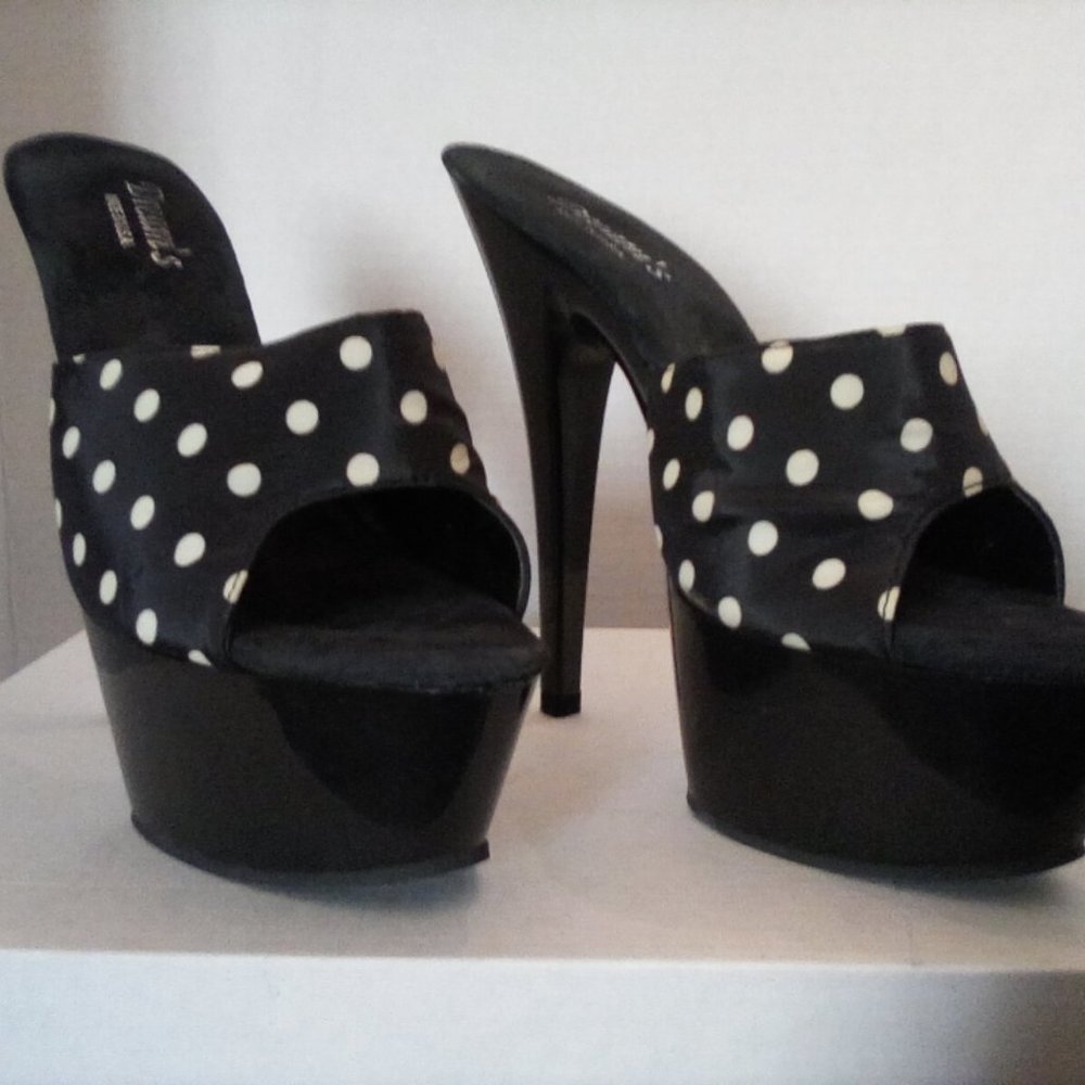 Size 7 unworn black and white polkadot platforms.